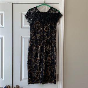 Black and nude lace cap sleeve dress